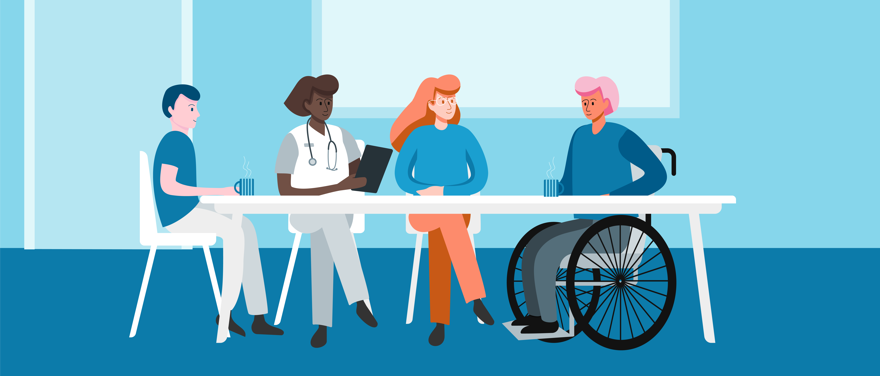 Fyra personer runt ett bord