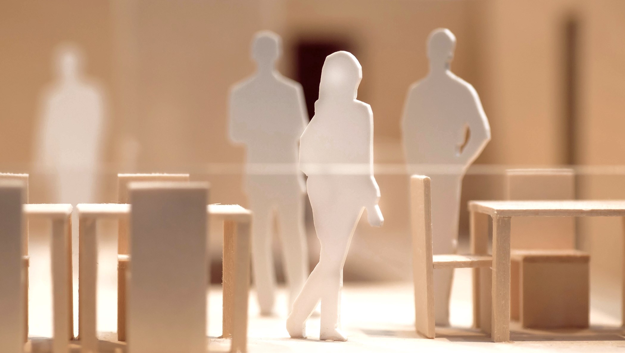 Bilden illustrerar människor i en arbetsmiljö